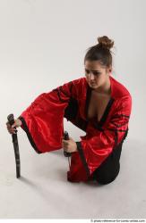 Katerina Ninja Kneeling Pose
